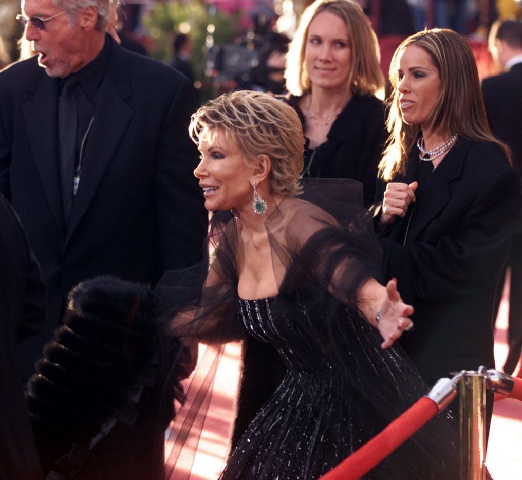 Joan  Rivers and her daughter Melissa stand on the red carpet prior to the start of the 74th...
