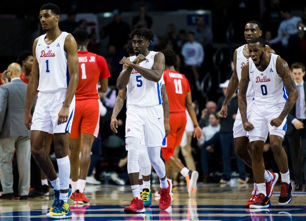 Southern Methodist Mustangs celebrates a point during the second half of a basketball game...