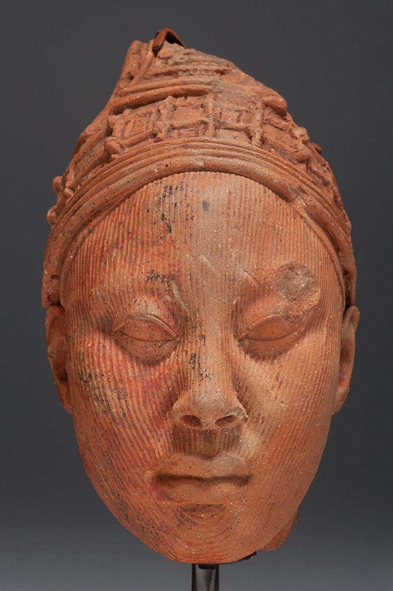 This terracotta sculpture is from the Yoruba culture in Nigeria, circa 12th-15th century,...