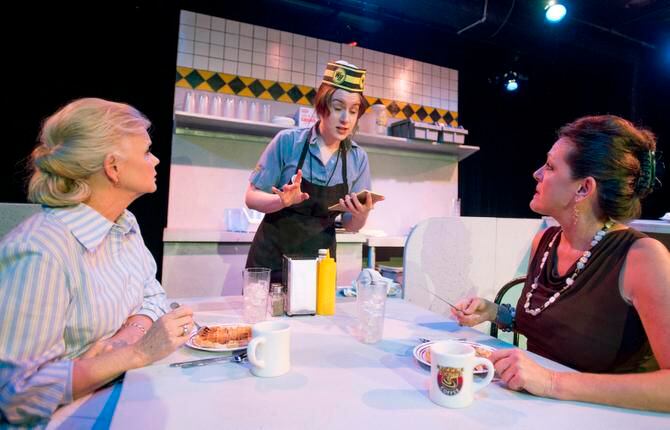 
Erin Singleton aptly portrays a weary waitress, with Marty Van Kleeck (left) and Mary Lang,...