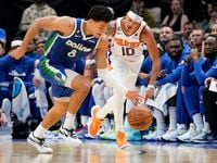 Dallas Mavericks guard Josh Green (8) steals the ball against Phoenix Suns guard Damion Lee...