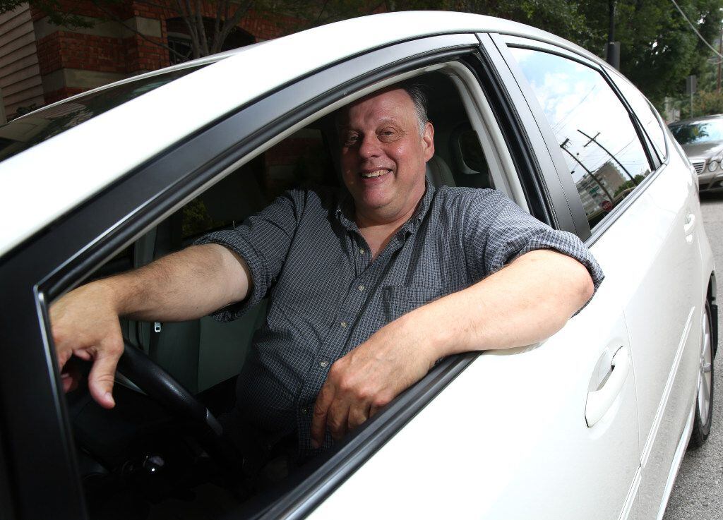 Lee Robertson, a 57-year-old Lyft driver, makes extra income driving when his photography...