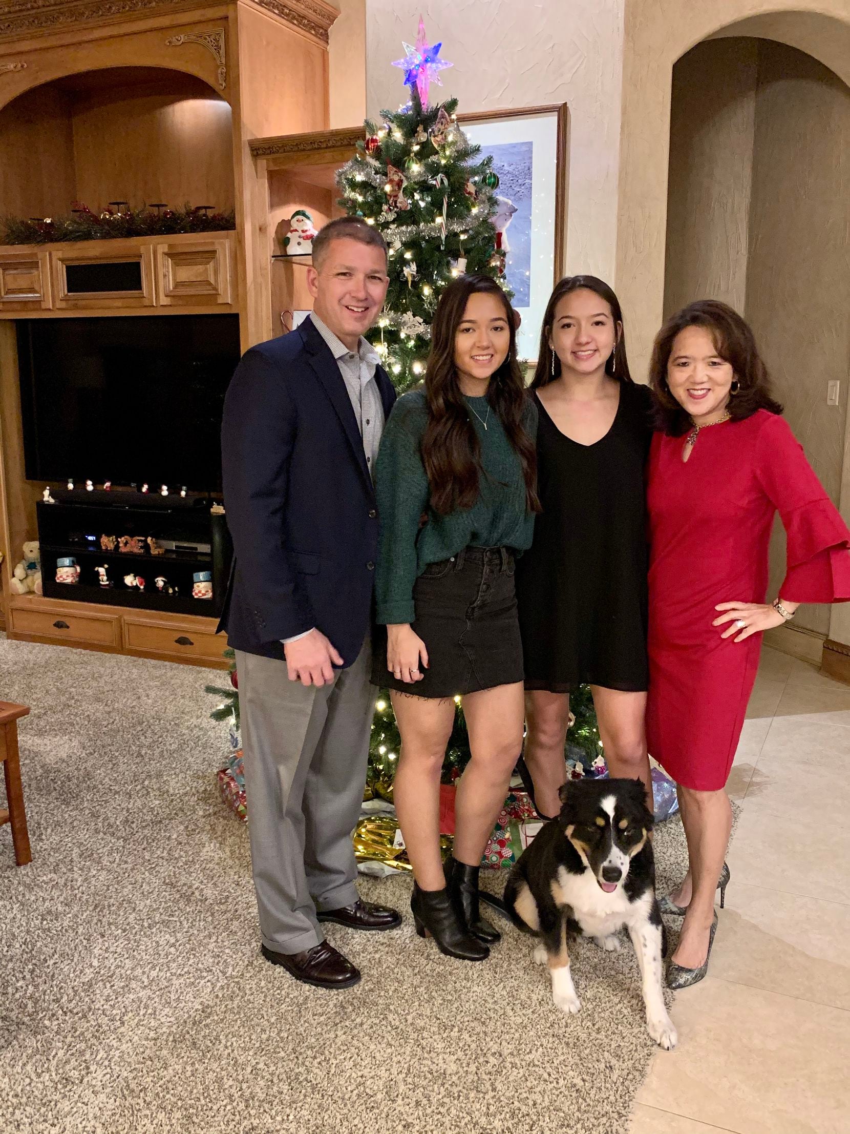 A Christmas 2019 photo of Bob Moore and Anne Chow with their daughters, Alana and Camryn Moore.