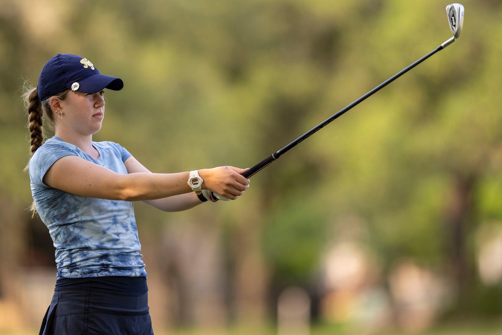 Highland Park’s Sophie Biediger studies her shot from the 3rd fairway during the 5A girls...