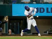 Texas Rangers designated hitter Adolis Garcia (53) hits a two-run home run during the fifth...