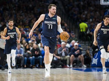 Dallas Mavericks guard Luka Doncic (77) takes the ball down the court during the second quarter of an NBA game between the Indiana Pacers and the Dallas Mavericks on Sunday, March 8, 2020 at American Airlines Center in Dallas.