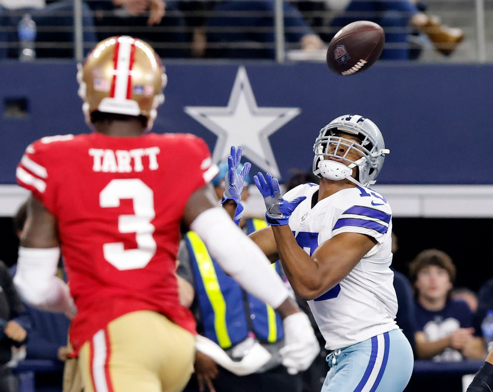 Dallas Cowboys wide receiver Amari Cooper (19) hauls in a second quarter touchdown pass in...