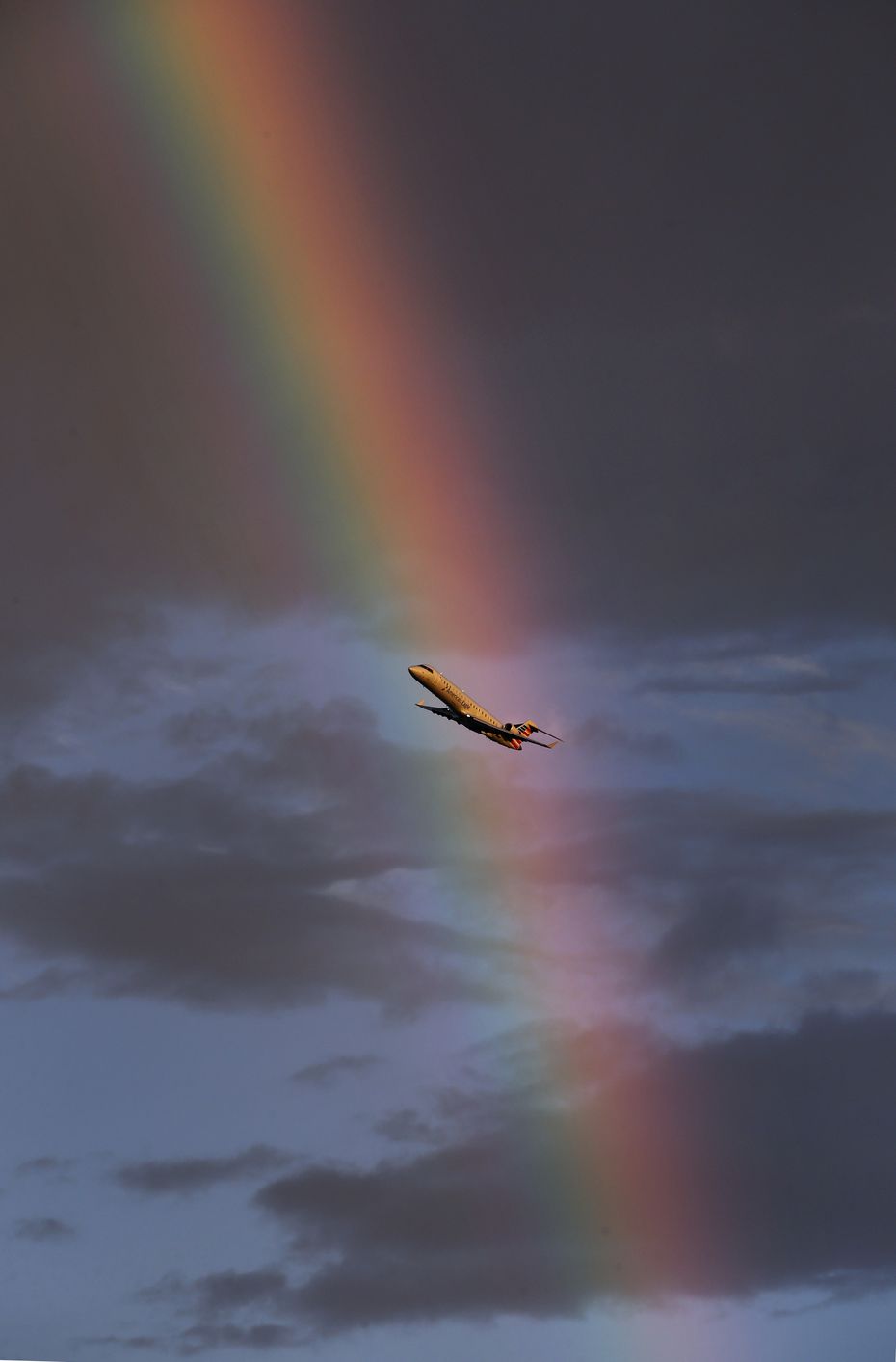 Remnants of Tropical Storm Laura made for a beautiful rainbow at sunset as an American Airlines jet took flight from DFW International Airport on Aug. 27, 2020.