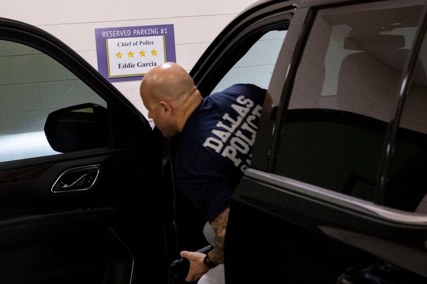 Dallas police Chief Eddie García gets out of his car in the garage at Jack Evans Police...