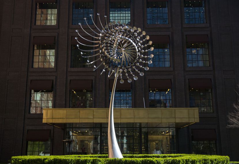 Anthony Howe's "Lucea" sculpture sits outside of Forty Five Ten, whose construction led to...