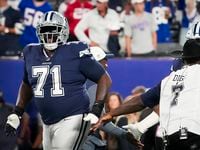 Dallas Cowboys offensive tackle Jason Peters (71) slaps hands with former Cowboys wide...