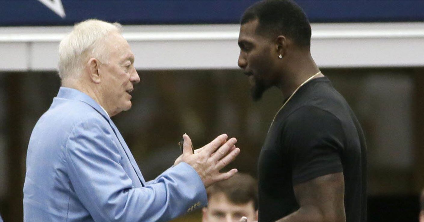 Dallas Cowboys wide receiver Dez Bryant, right, listens to team owner Jerry Jones on the...