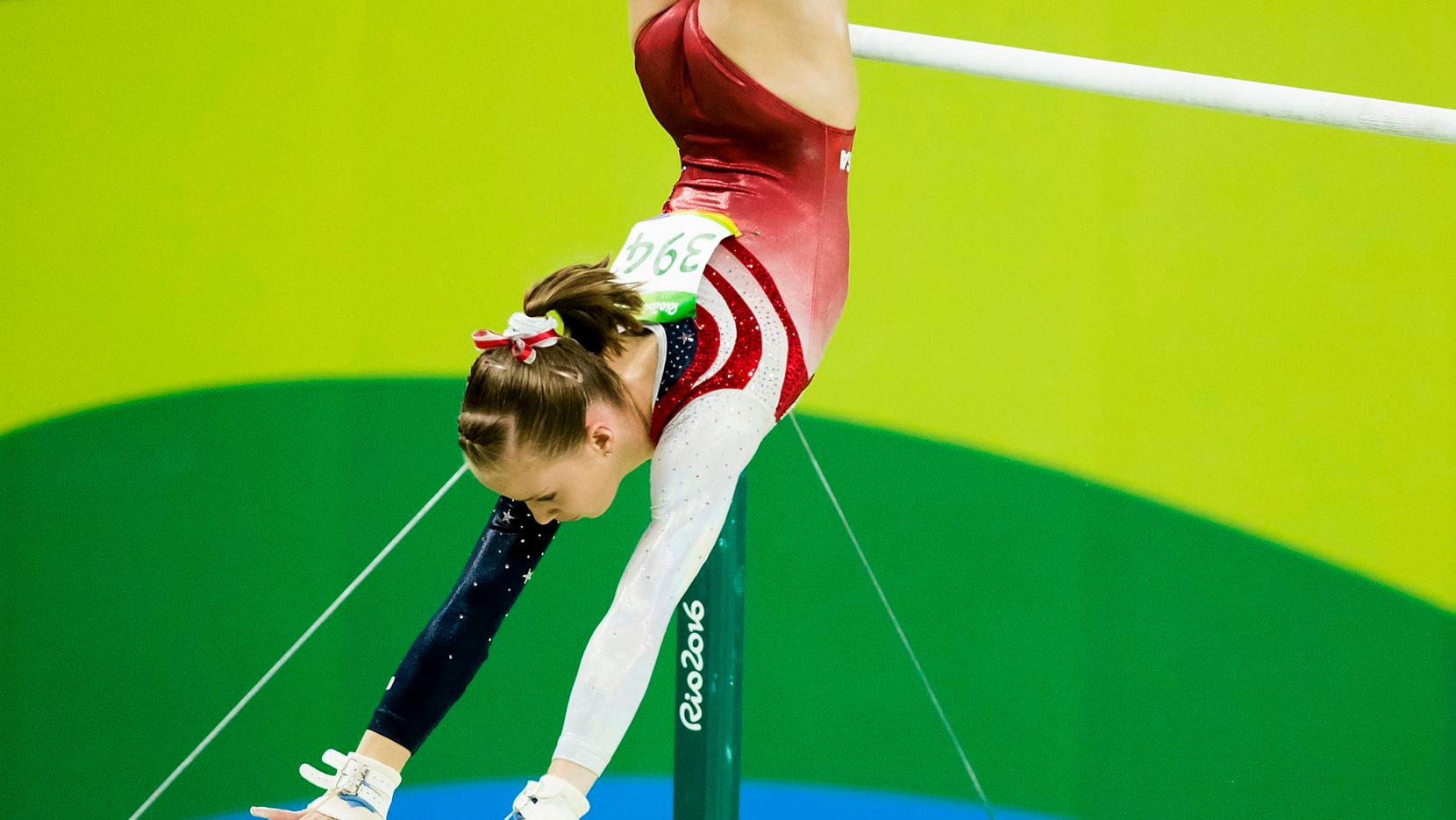 Madison Kocian of the United States competes on the uneven bars during the women's team...