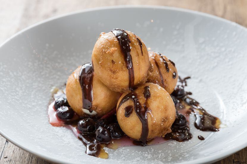 Cru Food and Wine Bar offers goat cheese beignets as part of its Easter offerings this year.