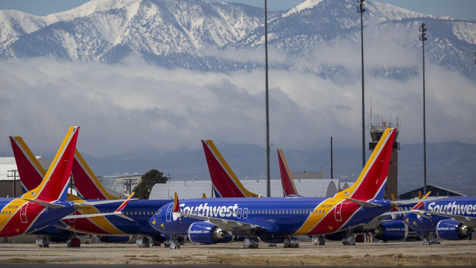 Southwest Airlines jets are parked in growing numbers at Southern California Logistics...