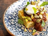 Anise restaurant’s dessert, olive oil cake with fig jam, whipped mascarpone, pistachios and a mint garnish