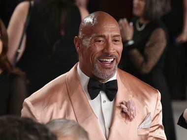 Dwayne Johnson arrives at the Oscars on Sunday, March 12, 2023, at the Dolby Theatre in Los...