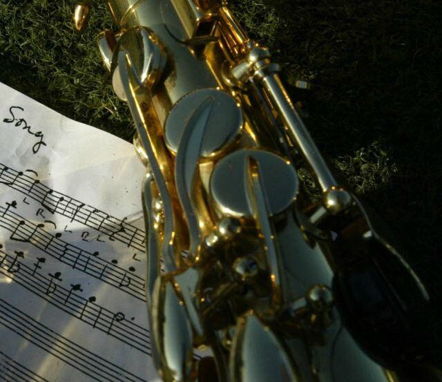 Music sheet and saxophone shot on Aug. 18, 2005.  