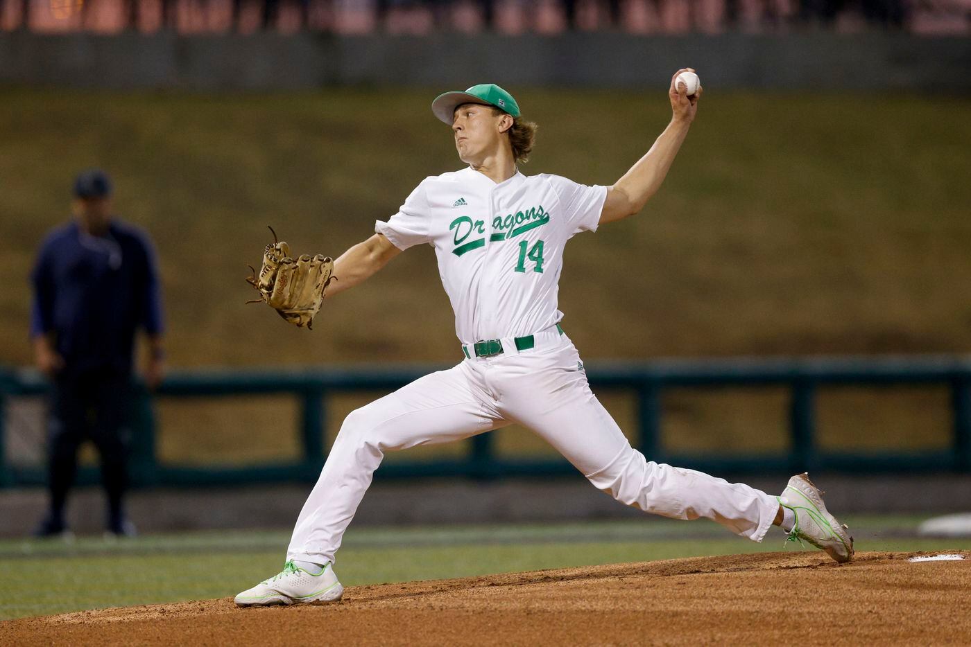 Southlake Carroll starting pitcher Griffin Herring (14) delivers a pitch during the first...
