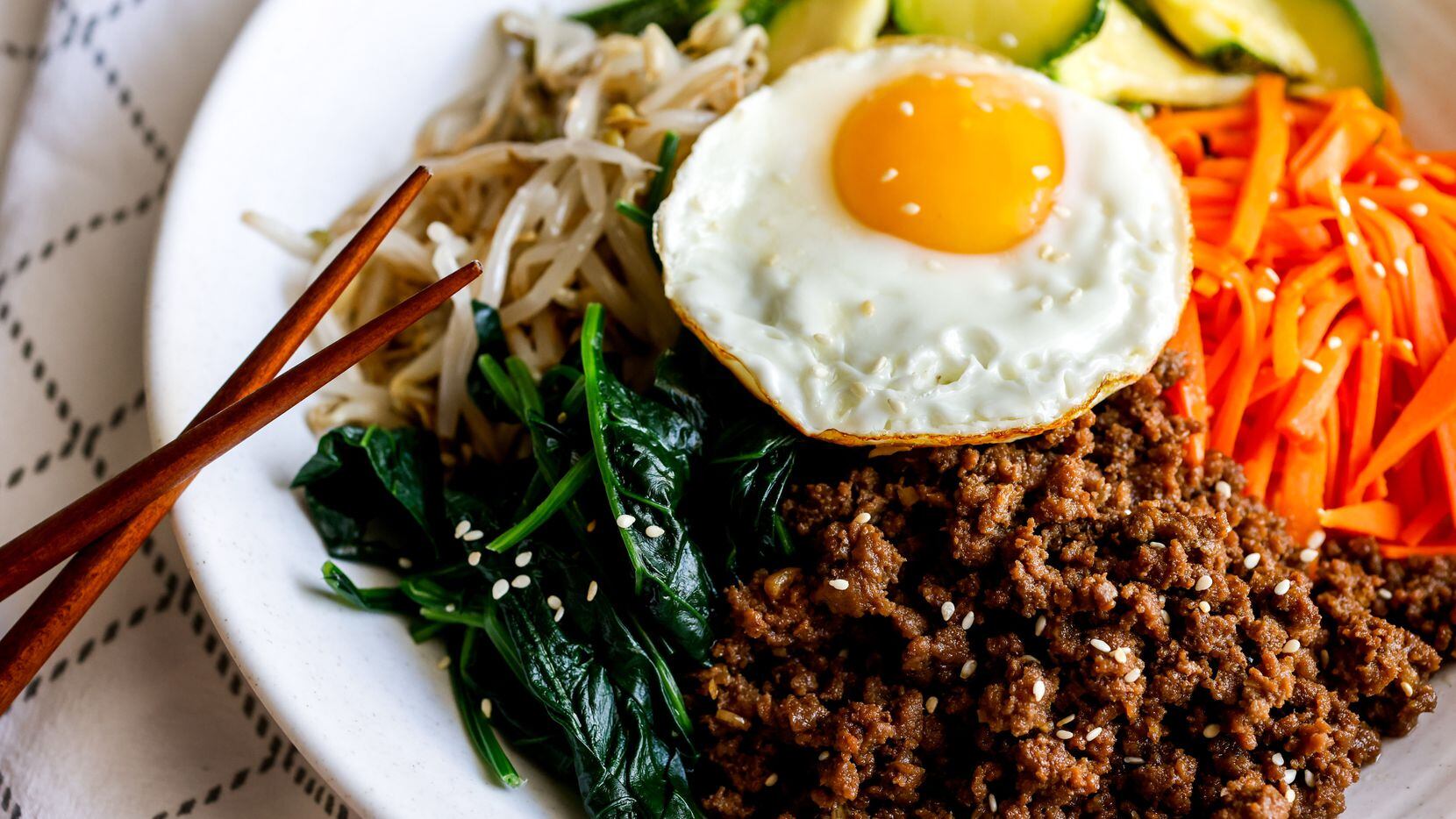Bibimbap with Ground Beef is a popular dish from Two Plaid Aprons.