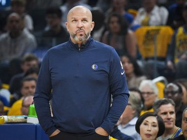 Dallas Mavericks head coach Jason Kidd () watches from the bench during the first quarter in...
