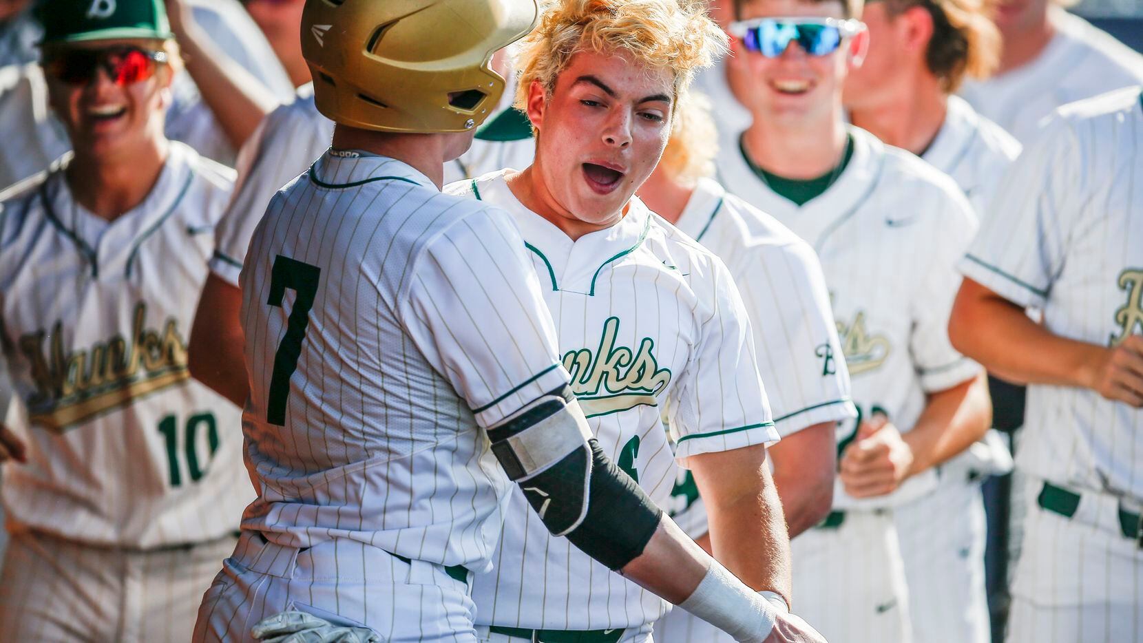 Birdville’s Bynum Martinez (6) is congratulated by teammates after scoring a run during the second inning of a high school Class 5A Region I quarterfinal series baseball game against Mansfield Legacy at Dallas Baptist University, Thursday, May 20, 2021. (Brandon Wade/Special Contributor)
