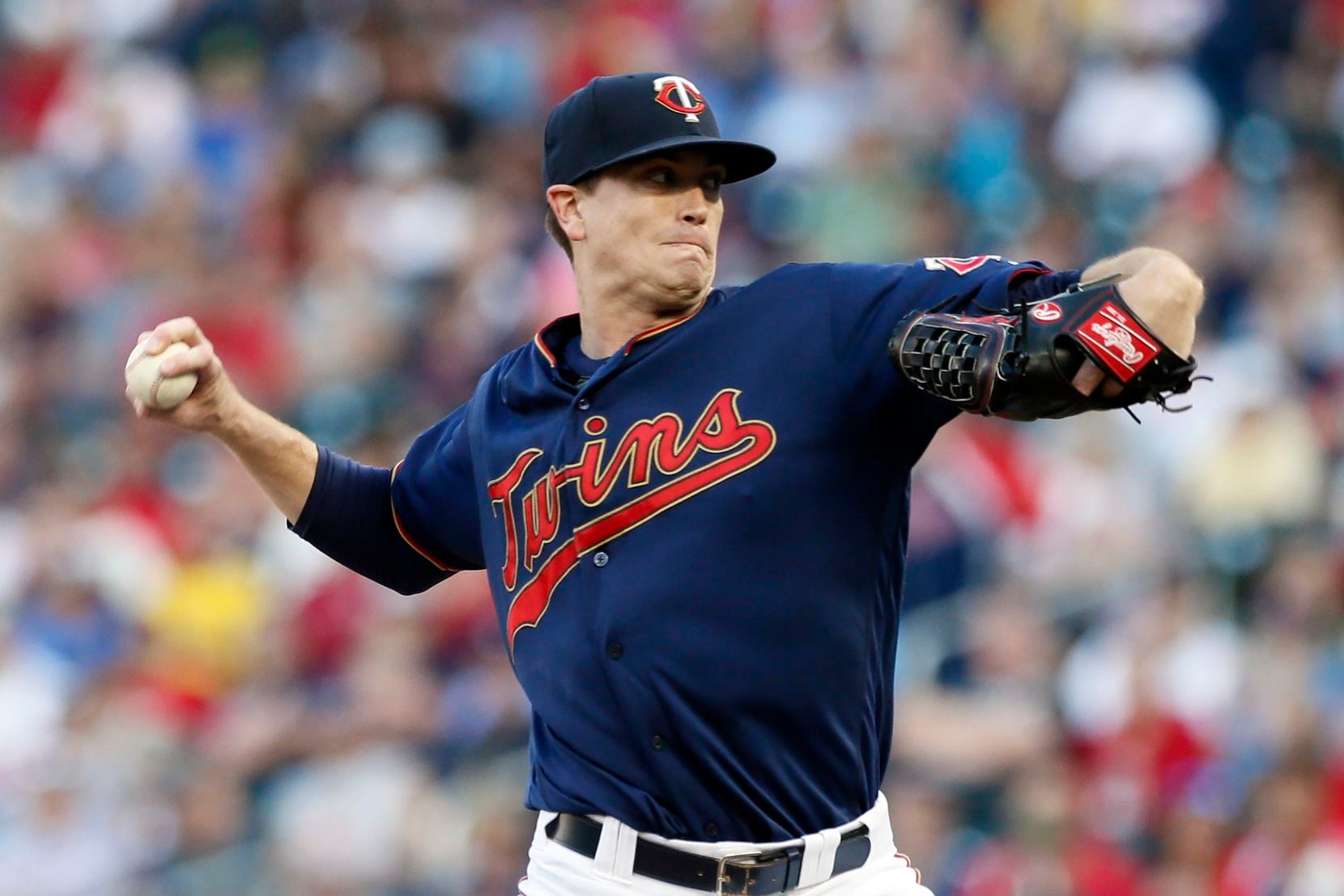 Minnesota Twins pitcher Kyle Gibson throws to a Cleveland Indians batter during the first...