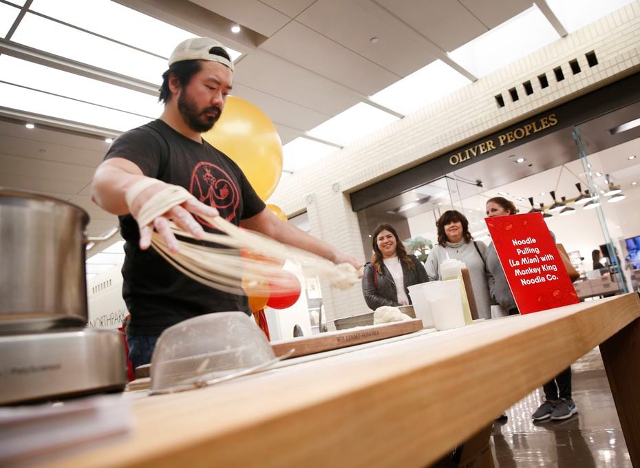 Andrew Chen, owner of Monkey King Noodle Company, demonstrates noodle making at the Chinese...