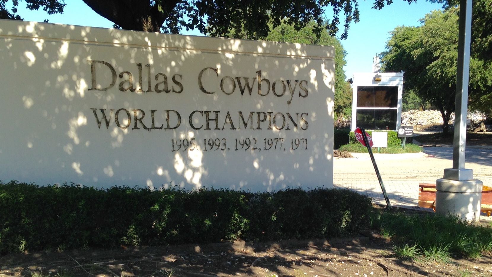 The old entryway to the former Dallas Cowboys headquarters in Irving still brags about past glory days.