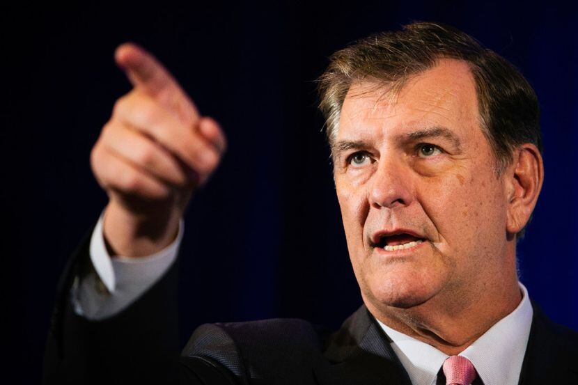 Dallas Mayor Mike Rawlings points to an intern in the crowd during his speech at the Dallas...