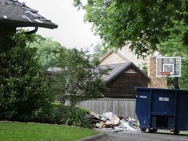 The remains of a fire at the home of Ira Tobolowsky, a longtime civil lawyer, along Kenshire...