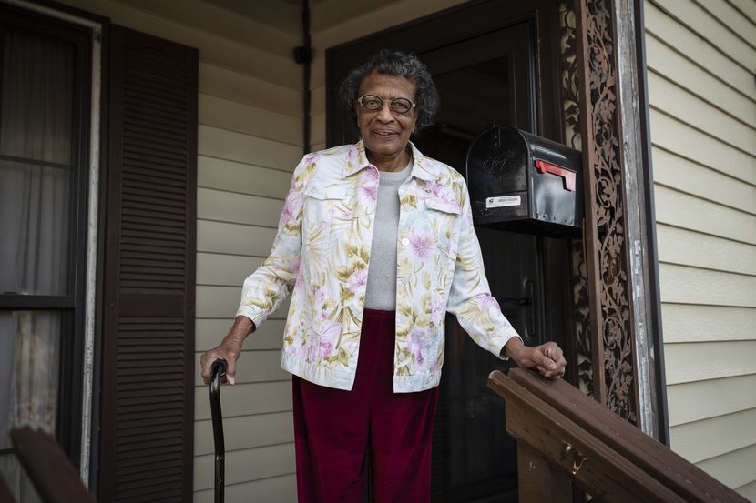 Marie Barree, 94, stands outside her home in the Tenth Street Historic District of Dallas.....