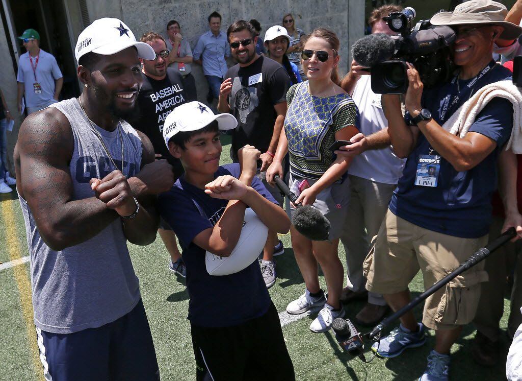 Dallas Cowboys wide receiver Dez Bryant (left) and 11-year-old Nihar Janga, co-champion of...