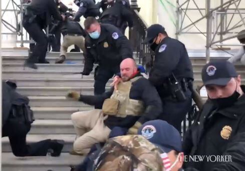 The FBI says this photo shows Donald Hazard fighting with Capitol police on Jan. 6.