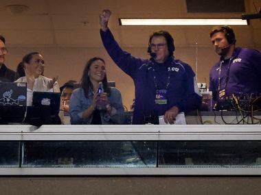 Longtime TCU Horned Frogs broadcaster John Denton (second from right) acknowledges the crowd...