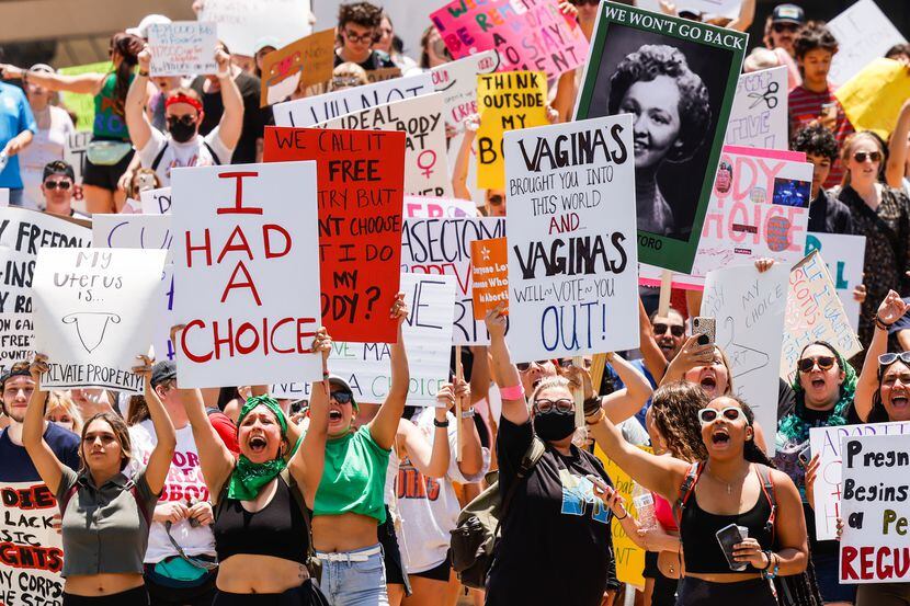Abortion rights supporters march from the Dallas City Hall to downtown Dallas on Wednesday,...