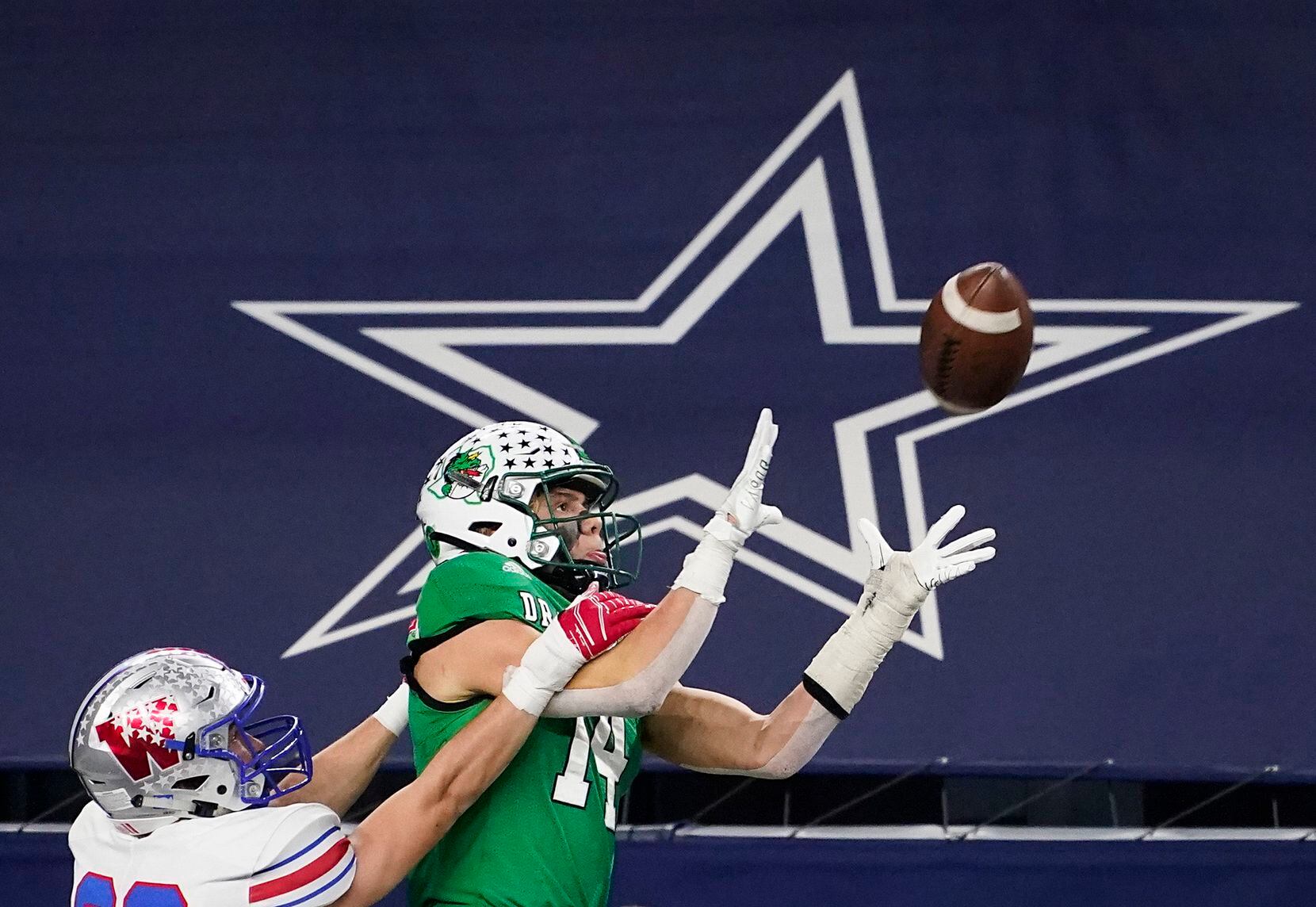 Austin Westlake defensive back Beau Breathard (23) breaks up a pass intended for Southlake Carroll wide receiver Brady Boyd (14) during the fourth quarter of the Class 6A Division I state football championship game at AT&T Stadium on Saturday, Jan. 16, 2021, in Arlington, Texas. Westlake won the game 52-34.