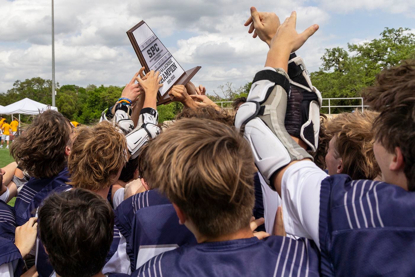 Episcopal School of Dallas celebrates a 14-5 win over St. Mark's during the Southwest...