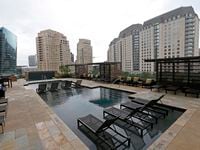 The outdoor pool on the 7th floor at The Jordan, modern luxury apartments, in the uptown...