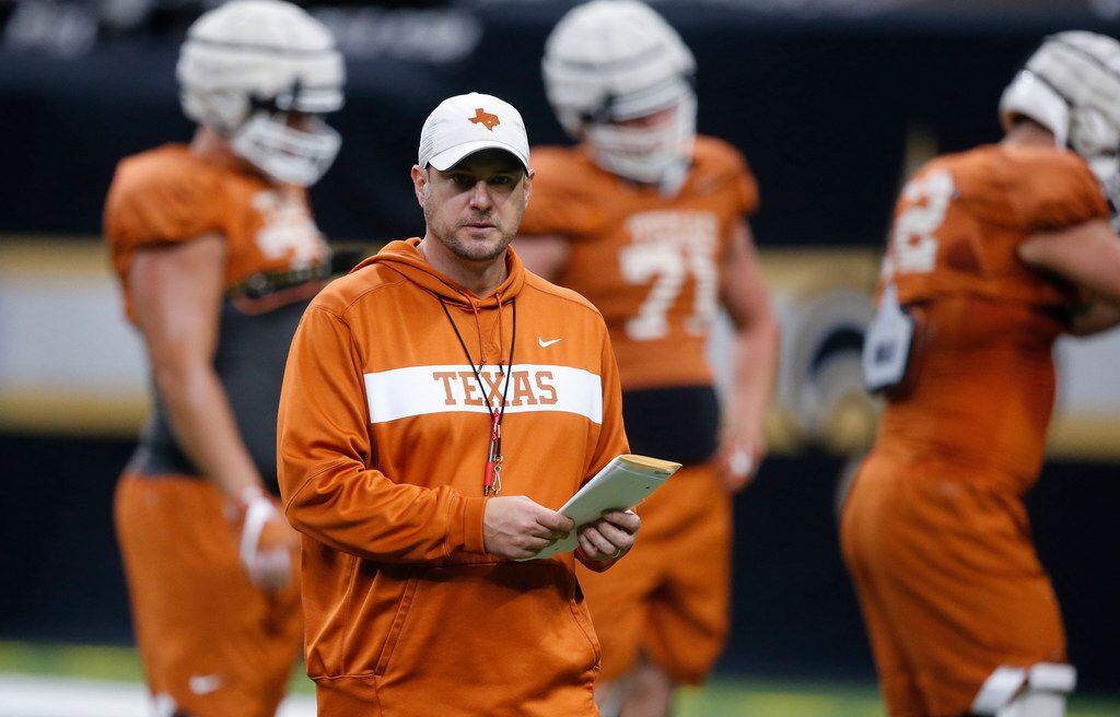 Texas head coach Tom Herman walks on the field during practice at the Superdome in New Orleans, Friday, Dec. 28, 2018. Texas will face Georgia in the Sugar Bowl NCAA college football game on Jan. 1, 2019. (AP Photo/Gerald Herbert)
