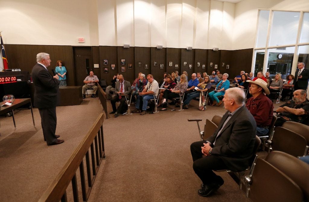 Rep. Joe Barton (left) speaks during a town hall meeting at Corsicana Government Center in...