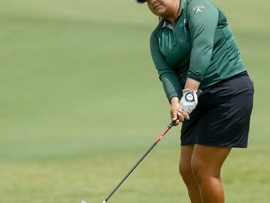 Professional golfer Lizette Salas chips a ball on to the No. 9 green during the second round...