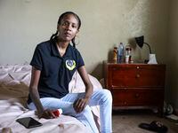 Brittany Jones poses for a picture in the bedroom of her apartment on Wednesday, May 11,...