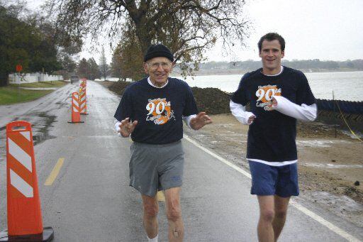 Orville Rogers runs with his grandson at White Rock Lake in celebration of his 90th...