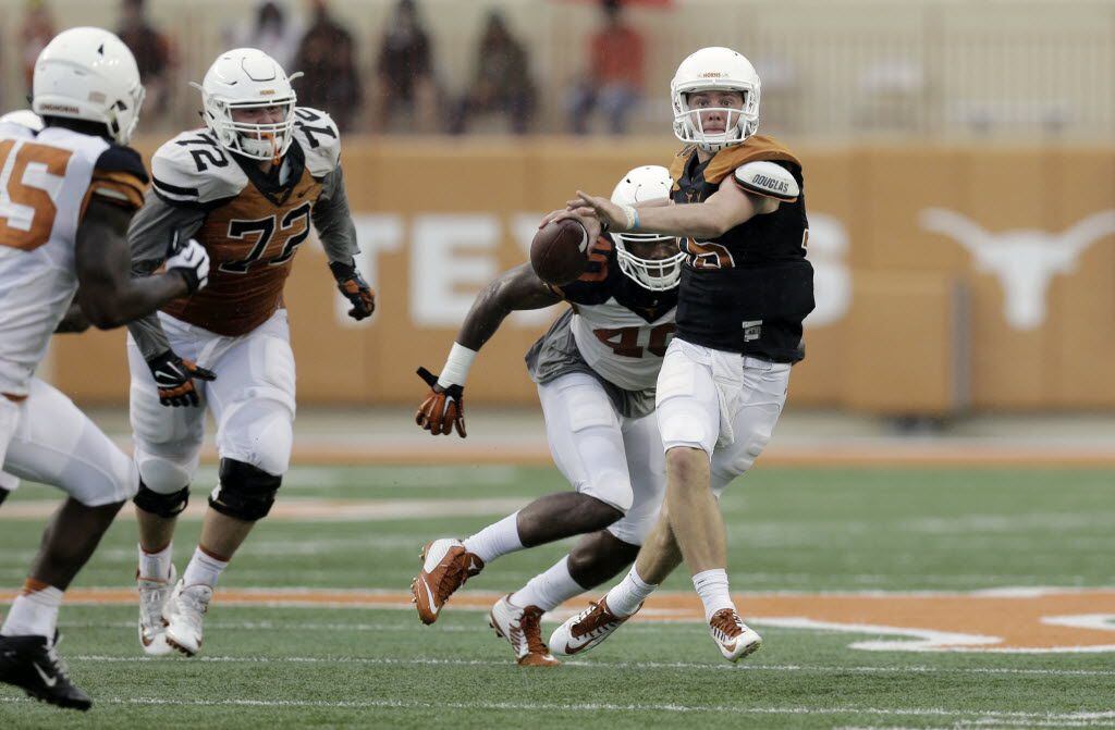 Texas quarterback Shane Buechele (16) looks to throw during a spring NCAA college football...