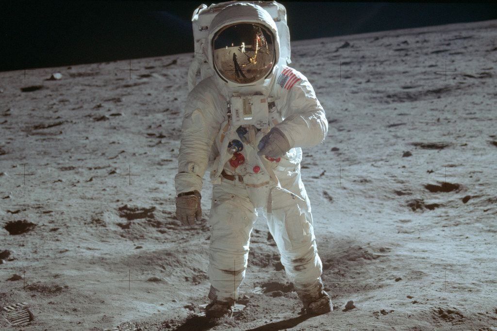 In this July 20, 1969, photo made available by NASA, astronaut Buzz Aldrin, lunar module...
