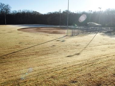 The ball field at the city's College Park next to the Lane Plating Works building.