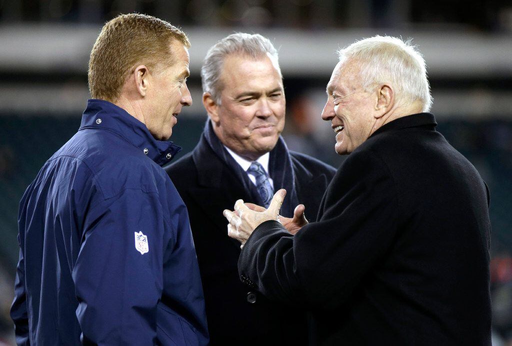 FILE - In this Dec. 14, 2014, file photo, Dallas Cowboys owner Jerry Jones, right, and son...