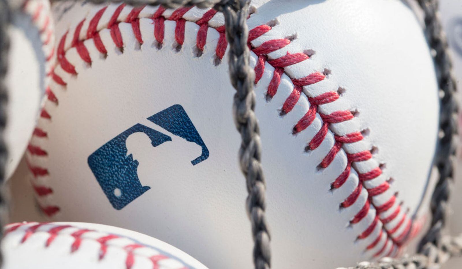 A baseball with MLB logo is seen at Citizens Bank Park before a game between the Washington...