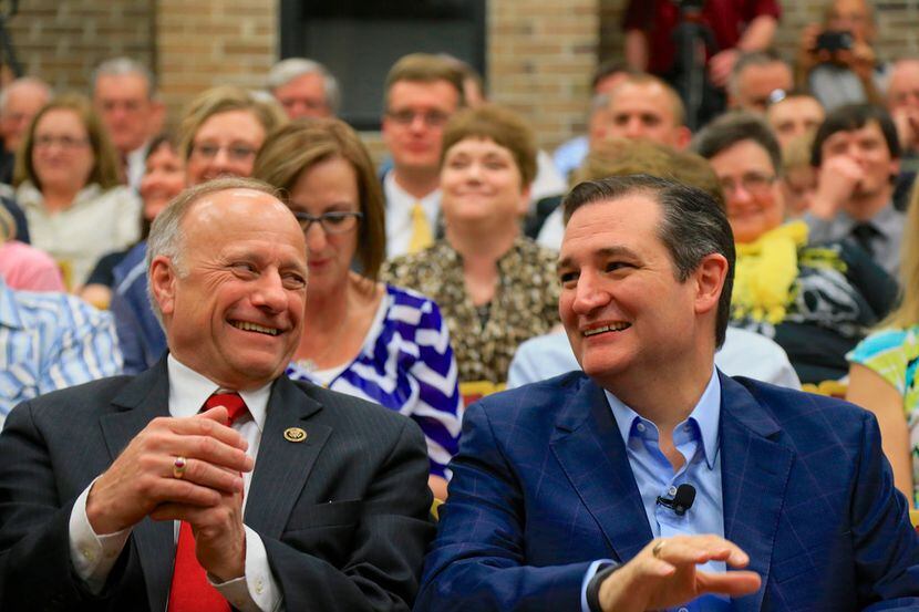  Sen. Ted Cruz (right) campaigned with Rep. Steve King, R-Iowa, at a town hall event at...